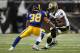 ST. LOUIS, MO - OCTOBER 30: Chris Ivory #29 of the New Orleans Saints looks to get past Josh Gordy #38 of the St. Louis Rams at the Edward Jones Dome on October 30, 2011 in St. Louis, Missouri. The Rams beat the Saints 31-21. (Photo by Dilip Vishwanat/Getty Images)