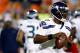 KANSAS CITY, MO - AUGUST 24: Quarterback Tarvaris Jackson #7 of the Seattle Seahawks rolls out during the NFL preseason game against the Kansas City Chiefs at Arrowhead Stadium on August 24, 2012 in Kansas City, Missouri. (Photo by Jamie Squire/Getty Images)