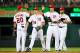 WASHINGTON, DC - AUGUST 17: Bryce Harper #34, Ian Desmond #20, Michael Morse #38, and Jayson Werth #28 of the Washington Nationals celebrate after defeating the New York Mets at Nationals Park on August 17, 2012 in Washington, DC. (Photo by Patrick McDermott/Getty Images)