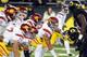 EUGENE, OR - NOVEMBER 19: Quarterback Matt Barkley #7 of the USC Trojans looks over the defense as Khaled Holmes #78 of the USC Trojans points out defenders in the fourth quarter of the game against the Oregon Ducks at Autzen Stadium on November 19, 2011 in Eugene, Oregon. USC won the game 38-35. (Photo by Steve Dykes/Getty Images)
