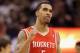 PHOENIX, AZ - FEBRUARY 09: Courtney Lee #5 of the Houston Rockets celebrates during the NBA game against the Phoenix Suns at US Airways Center on February 9, 2012 in Phoenix, Arizona. The Rockets defeated the Suns 96-89. NOTE TO USER: User expressly acknowledges and agrees that, by downloading and or using this photograph, User is consenting to the terms and conditions of the Getty Images License Agreement. (Photo by Christian Petersen/Getty Images)