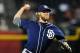 PHOENIX, AZ - JULY 03: Andrew Cashner #34 of the San Diego Padres delivers a pitch against the Arizona Diamondbacks at Chase Field on July 3, 2012 in Phoenix, Arizona. (Photo by Norm Hall/Getty Images)