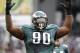 Oct 02, 2011; Philadelphia, PA, USA; Philadelphia Eagles defensive tackle Antonio Dixon (90) encourages the crowd during the second quarter against the San Francisco 49ers at Lincoln Financial Field. The 49ers defeated the Phillies 24-23. Mandatory Credit: Howard Smith-US PRESSWIRE