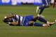 BRIDGEVIEW, IL - OCTOBER 12: Maicon Santos 9 of FC Dallas lays on the ground after suffering a head injury against the Chicago Fire during an MLS match at Toyota Park on October 12, 2011 in Bridgeview, Illinois. FC Dallas defeated the Fire 2-1. (Photo by Jonathan Daniel/Getty Images)