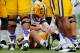 BATON ROUGE, LA - SEPTEMBER 01: Zach Mettenberger #8 of the LSU Tigers sits on the ground after being tackled during the game against the North Texas Mean Green at Tiger Stadium on September 1, 2012 in Baton Rouge, Louisiana. (Photo by Chris Graythen/Getty Images)