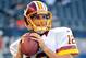 August 18, 2012; Chicago, IL, USA; Washington Redskins quarterback Kirk Cousins (12) before the game against the Chicago Bears at Soldier Field. Mandatory Credit: Rob Grabowski-US PRESSWIRE