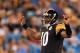 CHARLOTTE, NC - SEPTEMBER 01: Dennis Dixon #10 of the Pittsburgh Steelers against the Carolina Panthers during their preseason game at Bank of America Stadium on September 1, 2011 in Charlotte, North Carolina. (Photo by Streeter Lecka/Getty Images)