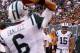 Aug. 18, 2011; East Rutherford, NJ, USA; New York Jets quarterback Mark Sanchez (6) throws to quarterback Tim Tebow (15) on the sidelines during the first half against the New York Giants at MetLife Stadium. Mandatory Credit: Debby Wong-US PRESSWIRE
