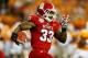 ATLANTA, GA - AUGUST 31: Mustafa Greene #33 of the North Carolina State Wolfpack rushes against the Tennessee Volunteers at Georgia Dome on August 31, 2012 in Atlanta, Georgia. (Photo by Kevin C. Cox/Getty Images)