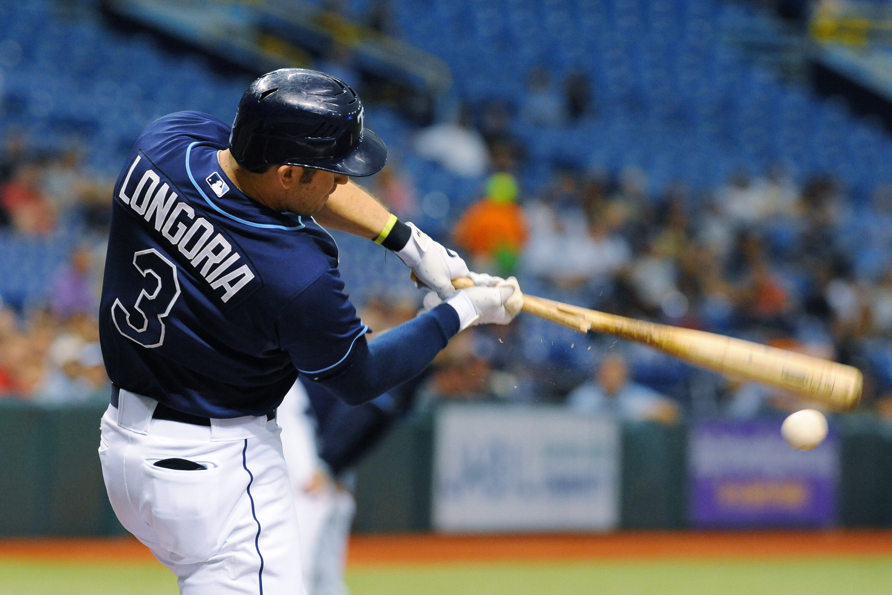 Tampa Bay Rays Evan Longoria removes his batting gear after