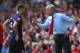 LIVERPOOL, ENGLAND - SEPTEMBER 02: Arsene Wenger the manager of Arsenal gives Thomas Vermaelen instructions during the Barclays Premier League match between Liverpool and Arsenal at Anfield on September 2, 2012 in Liverpool, England. (Photo by Alex Livesey/Getty Images)