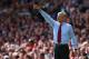 LIVERPOOL, ENGLAND - SEPTEMBER 02: Arsene Wenger the manager of Arsenal gives his players instructions during the Barclays Premier League match between Liverpool and Arsenal at Anfield on September 2, 2012 in Liverpool, England. (Photo by Alex Livesey/Getty Images)