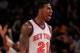 NEW YORK, NY - MARCH 28: Iman Shumpert #21 of the New York Knicks reacts during the game against the Orlando Magic at Madison Square Garden on March 28, 2012 in New York City. NOTE TO USER: User expressly acknowledges and agrees that, by downloading and/or using this Photograph, user is consenting to the terms and conditions of the Getty Images License Agreement. (Photo by Chris Trotman/Getty Images)
