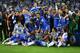 MUNICH, GERMANY - MAY 19: Chelsea players celebrate with the trophy after their victory in the UEFA Champions League Final between FC Bayern Muenchen and Chelsea at the Fussball Arena München on May 19, 2012 in Munich, Germany. (Photo by Alex Livesey/Getty Images)