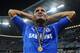 MUNICH, GERMANY - MAY 19: Florent Malouda of Chelsea celebrates with his medal after their victory in the UEFA Champions League Final between FC Bayern Muenchen and Chelsea at the Fussball Arena München on May 19, 2012 in Munich, Germany. (Photo by Mike Hewitt/Getty Images)