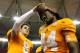 ATLANTA, GA - AUGUST 31: Tyler Bray #8 of the Tennessee Volunteers puts the leather helmet on Cordarrelle Patterson #84 after their 35-21 win over the North Carolina State Wolfpack at Georgia Dome on August 31, 2012 in Atlanta, Georgia. (Photo by Kevin C. Cox/Getty Images)