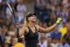 NEW YORK, NY - SEPTEMBER 02: Maria Sharapova of Russia tries to get the fans going after her match win over Nadia Petrova of Russia during Day Seven of the 2012 US Open at USTA Billie Jean King National Tennis Center on September 2, 2012 in the Flushing neighborhood of the Queens borough of New York City. (Photo by Elsa/Getty Images)
