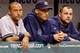 Yanks in the tank: Derek Jeter, Andy Pettitte and Joba Chamberlain feel the heat.