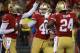 SAN FRANCISCO, CA - AUGUST 30: Garrett Celek #48, Anthony Dixon #24 and Josh Johnson #1 of the San Francisco 49ers celebrates after Celek caught a touchdown pass in the third quarter against the San Diego Chargers during an NFL pre-season football game at Candlestick Park on August 30, 2012 in San Francisco, California. The 49ers won the game 35-3. (Photo by Thearon W. Henderson/Getty Images)