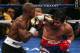 LAS VEGAS, NV - JUNE 09: (L-R) Timothy Bradley lands a left to the head of Manny Pacquiao during their WBO welterweight title fight at MGM Grand Garden Arena on June 9, 2012 in Las Vegas, Nevada. (Photo by Jeff Bottari/Getty Images)