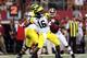 ARLINGTON, TX - SEPTEMBER 01: Denard Robinson #16 of the Michigan Wolverines throws the ball against the Alabama Crimson Tide at Cowboys Stadium on September 1, 2012 in Arlington, Texas. (Photo by Ronald Martinez/Getty Images)