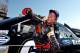 RICHMOND, VA - SEPTEMBER 07: Travis Pastrana, driver of the #60 Ford EcoBoost Ford, smiles as he gets out of his car during qualifying for the NASCAR Nationwide Series Virginia 529 College Savings 250 at Richmond International Raceway on September 7, 2012 in Richmond, Virginia. (Photo by Rainier Ehrhardt/Getty Images)