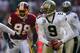 LANDOVER, MD - DECEMBER 06: Drew Brees #9 of the New Orleans Saints looks to pass against the Washington Redskins on December 6, 2009 at FedExField in Landover, Maryland. (Photo by Chris McGrath/Getty Images)