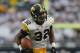 CHICAGO, IL - SEPTEMBER 01: Damon Bullock #32 of the Iowa Hawkeyes runs for the game-winning touchdown against the Northern Illinois Huskies at Soldier Field on September 1, 2012 in Chicago, Illinois. Iowa defeated Northern Illinois 18-17. (Photo by Jonathan Daniel/Getty Images)