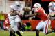 LINCOLN, NE - OCTOBER 8: Running back Carlos Hyde #34 of the Ohio State Buckeyes tries to hold off linebacker Lavonte David #4 of the Nebraska Cornhuskers during their game at Memorial Stadium October 8, 2011 in Lincoln, Nebraska. Nebraska won 34-27. (Photo by Eric Francis/Getty Images)