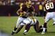 Aug 29, 2012; Landover, MD, USA; Washington Redskins running back Roy Helu (29) rushes through the Tampa Bay Buccaneers defense during the second half at FedEx Field. Mandatory Credit: Rafael Suanes-US PRESSWIRE