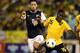 KINGSTON, JAMAICA - SEPTEMBER 07: Clint Dempsey #8 of the United States battles for the ball with Je-Vaughn Watson #15 of Jamaica during the United States and Jamaica World Cup Qualifier at National Stadium on September 7, 2012 in Kingston, Jamaica. (Photo by Marc Serota/Getty Images)