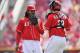 CINCINNATI, OH - SEPTEMBER 9: Pitcher Johnny Cueto #47 of the Cincinnati Reds and catcher Ryan Hanigan #29 of the Cincinnati Reds hide their mouths as they conference at the mound during the game against the Houston Astros at Great American Ball Park on September 9, 2012 in Cincinnati, Ohio. (Photo by Jamie Sabau/Getty Images)