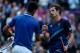 LONDON, ENGLAND - AUGUST 03: Andy Murray (R) of Great Britain is congratulated by Novak Djokovic (L) of Serbia after his 7-5, 7-5 win in the Semifinal of Men's Singles Tennis on Day 7 of the London 2012 Olympic Games at Wimbledon on August 3, 2012 in London, England. (Photo by Clive Brunskill/Getty Images)