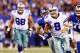 EAST RUTHERFORD, NJ - SEPTEMBER 05: Quarterback Tony Romo #9 of the Dallas Cowboys runs with the ball against the New York Giants during the 2012 NFL season opener at MetLife Stadium on September 5, 2012 in East Rutherford, New Jersey. (Photo by Al Bello/Getty Images)