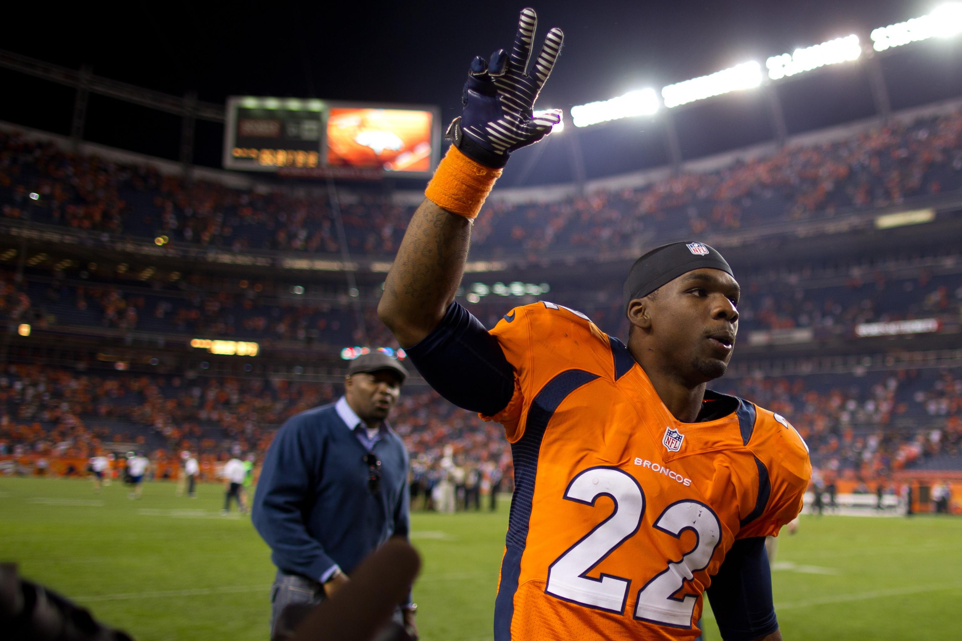 Denver Broncos cornerback Champ Bailey knocks down a fourth down