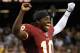 NEW ORLEANS, LA - SEPTEMBER 09: Robert Griffin III #10 of the Washington Redskins celebrates a 40-32 win against the New Orleans Saints during the season opener at Mercedes-Benz Superdome on September 9, 2012 in New Orleans, Louisiana. (Photo by Ronald Martinez/Getty Images)