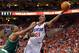 PHILADELPHIA, PA - MAY 16: Thaddeus Young #21 of the Philadelphia 76ers lays up a shot past Paul Pierce #34 of the Boston Celtics in Game Three of the Eastern Conference Semifinals in the 2012 NBA Playoffs at the Wells Fargo Center on May 16, 2012 in Philadelphia, Pennsylvania. NOTE TO USER: User expressly acknowledges and agrees that, by downloading and or using this photograph, User is consenting to the terms and conditions of the Getty Images License Agreement. (Photo by Drew Hallowell/Getty Images)