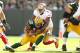 GREEN BAY, WI - SEPTEMBER 09: Aaron Rodgers #12 of the Green Bay Packers is sacked by Carlos Rogers #22 of the San Francisco 49ers during the NFL season opener at Lambeau Field on September 9, 2012 in Green Bay, Wisconsin. (Photo by Andy Lyons/Getty Images)