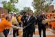 Sep 8, 2012; Knoxville, TN, USA; Tennessee Volunteers head coach Derek Dooley greets fans during the seasons first Vol Walk prior to the game against the Georgia State Panthers at Neyland Stadium. Mandatory Credit: Jim Brown-US PRESSWIRE