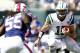 EAST RUTHERFORD, NJ - SEPTEMBER 09: Tim Tebow #15 of the New York Jets scrambles during the season opener against the Buffalo Bills at MetLife Stadium on September 9, 2012 in East Rutherford, New Jersey. (Photo by Jeff Zelevansky/Getty Images)