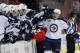 WASHINGTON, DC - MARCH 23: Spencer Machacek #46 of the Winnipeg Jets celebrates with the bench after scoring the game tying goal against the Washington Capitals during the third period at Verizon Center on March 23, 2012 in Washington, DC. (Photo by Rob Carr/Getty Images)