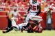 KANSAS CITY, MO - SEPTEMBER 09: Wide receiver Dwayne Bowe #82 of the Kansas City Chiefs is tackled by cornerback Brent Grimes #20 of the Atlanta Falcons after making a catch during the game at Arrowhead Stadium on September 9, 2012 in Kansas City, Missouri. (Photo by Jamie Squire/Getty Images)
