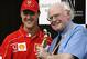 INDIANAPOLIS - SEPTEMBER 28: Ferrari driver Michael Schumacher of Germany and Formula One Doctor Sid Watkins with the Bernie Award during the second practice for the US Formula One Grand Prix held on September 28, 2002 at the Indianapolis Motorspeedway, in Indianapolis, USA. (Photo by Getty Images)
