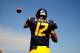 Oct. 23, 2010; Morgantown, WV, USA; West Virginia Mountaineers quarterback Geno Smith (12) warms up prior to the game against the Syracuse Orange at Mountaineer Field at Milan Puskar Stadium. Mandatory Credit: Andrew Weber-US PRESSWIRE