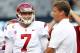 EAST RUTHERFORD, NJ - SEPTEMBER 8: Matt Barkley #7 of the USC Trojans talks with head coach Lane Kiffin before the start of their game against the Syracuse Orange at MetLife Stadium on September 8, 2012 in East Rutherford, New Jersey. (Photo by Rich Schultz /Getty Images)