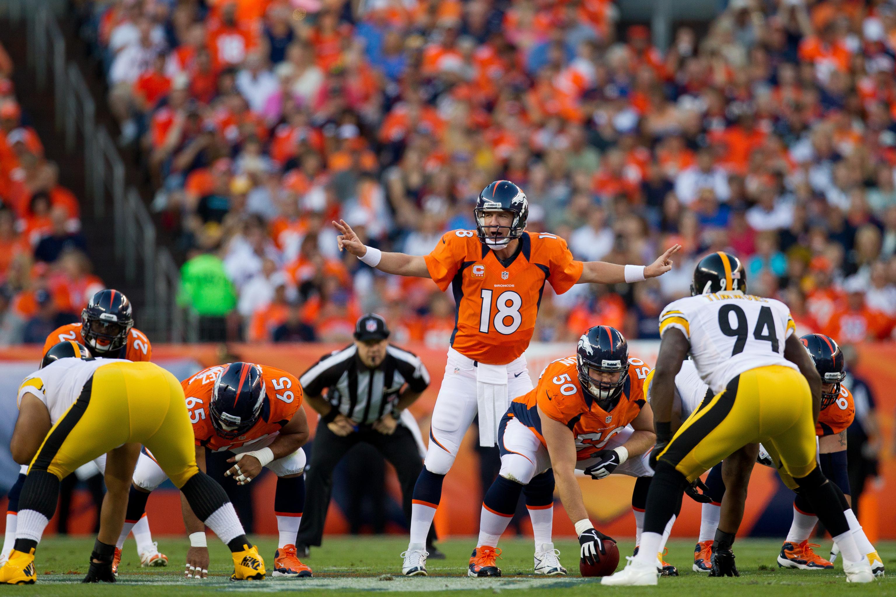 Peyton Manning adjusting to new offense in Denver