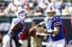 EAST RUTHERFORD, NJ - SEPTEMBER 09: Ryan Fitzpatrick #14 of the Buffalo Bills looks for an open man against the New York Jets during their game at MetLife Stadium on September 9, 2012 in East Rutherford, New Jersey. (Photo by Jeff Zelevansky/Getty Images)