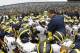 ANN ARBOR, MI - APRIL 16: Head football coach Brady Hoke talks with his team during the annual Spring Game at Michigan Stadium on April 16, 2011 in Ann Arbor, Michigan. (Photo by Leon Halip/Getty Images)