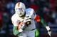 CHESTNUT HILL, MA - NOVEMBER 24: Dedrick Epps #18 of the Miami Hurricanes carries the ball against the Boston College Eagles on November 24, 2007 at Alumni Stadium in in Chestnut Hill, Massachusetts. Boston College defeated Miami 28-14. (Photo by Elsa/Getty Images)