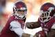 LITTLE ROCK, AR - SEPTEMBER 8: Tyler Wilson #8 hands off the ball to Knile Davis #7 of the Arkansas Razorbacks during a game against the Louisiana-Monroe Warhawks at War Memorial Stadium on September 8, 2012 in Little Rock, Arkansas. The Warhawks defeated the Razorbacks 34-31. (Photo by Wesley Hitt/Getty Images)